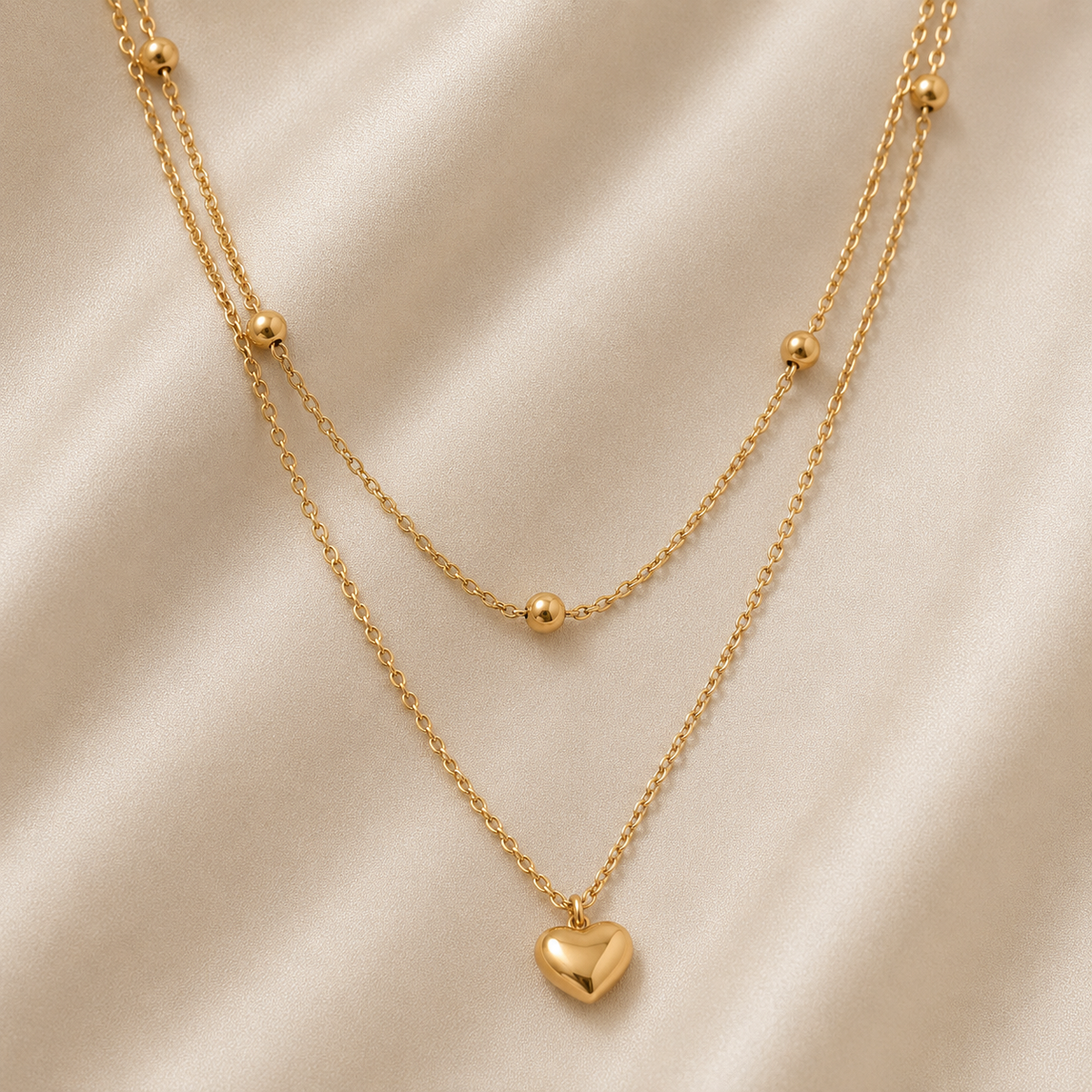 Collier double chaîne billes et pendentif petit cœur Dona